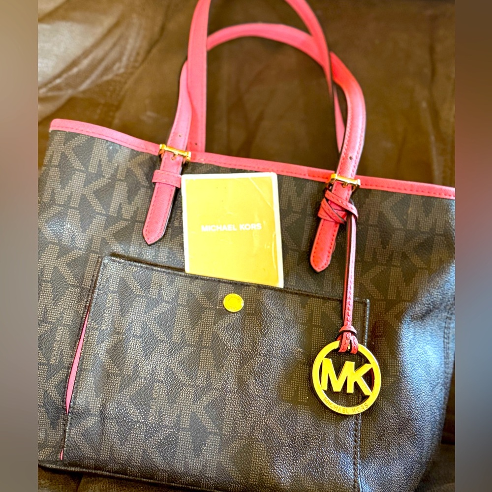 authentic Michael Kors Black and Pink Tote Bag
$100